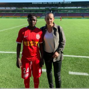 Black Queens coach Nora Häuptle watches Princess Dankwa Marfo while in action for FC Nordsjaelland Women