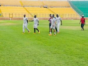 Ghana coach Chris Hughton inspects Baba Yara Sports Stadium pitch ahead of Namibia friendly