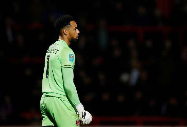 Ghana goalkeeper Joseph Wollacott saves a penalty, helps Crawley to beat Swindon Town 4-2